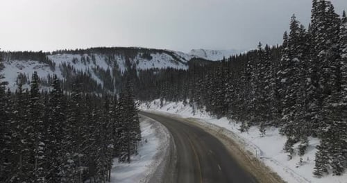 Aerial views of winding roads in the Colorado Rocky Mountains
