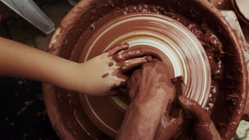 Shaping A Clay Pot In A Ceramics Workshop 52