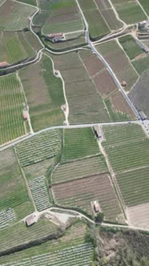 Aerial video of an agricultural area near Sierra Aitana, Spain