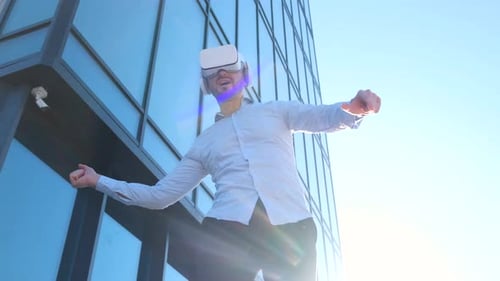 Manager Wearing VR Glasses Moving His Hands in the Air Office Worker Uses Virtual Reality Headset