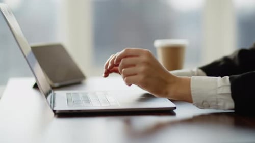 Close Up of Beautiful Authentic Specialist Woman in Modern Office That Worki on Laptop Computer She