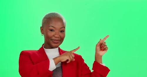 Happy, black woman and pointing with green screen in marketing or advertising on a studio