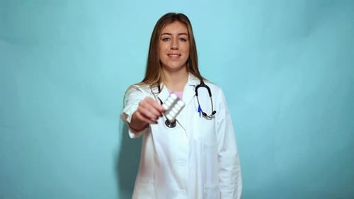 Doctor Offers Pills in Medical Setting