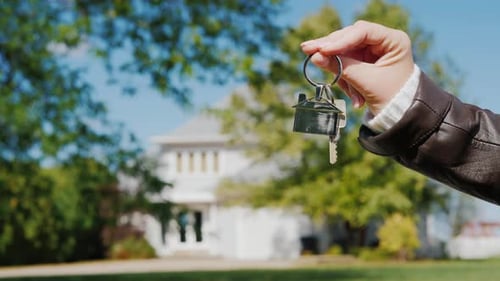 Hand with the Key From the House