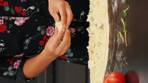 Woman Preparing Food on Kitchen Table