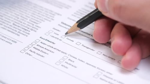 Filling out Form, Marking Transgender with Pencil