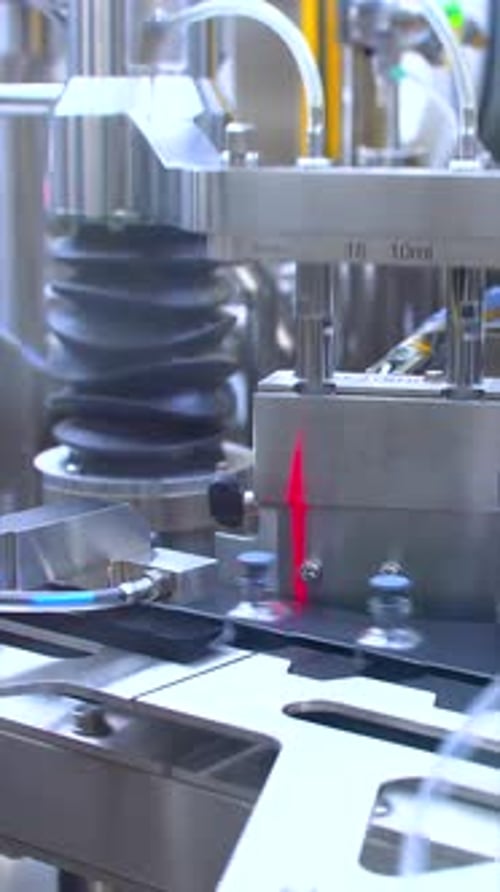 Automated Pharmaceutical Manufacturing: Vial Filling Machine