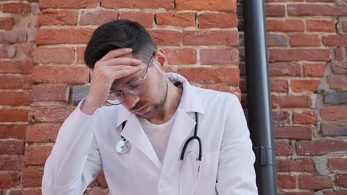 Sad Professional Doctor Having Headache Outdoor Close Eyes Rest After Hard Work