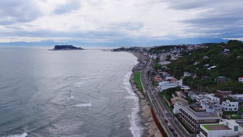 Aerial View of Kamakuro Coastline with Island and Lighthouse