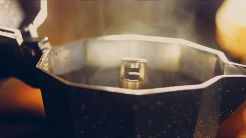 Moka Pot Brewing Coffee Steam Close-Up