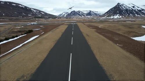 Remote Mountain Road Runway In Icelandic Landscape.