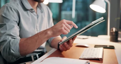 Man using Tablet at Desk in Home Office