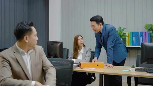 Office Workers Collaborating in an Urban Workplace