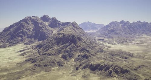 Majestic Mountain Landscape in a Vast Arid Region Under Clear Blue Skies