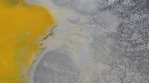 Patterns of acid mine drainage in decanting lake, nature pollution, aerial view