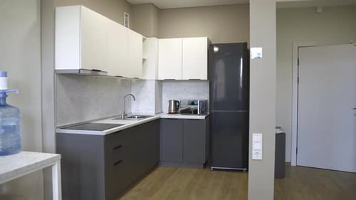 Kitchen Area with Minimalist Cabinets Sink and Appliances