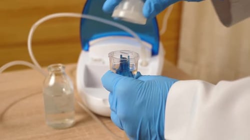 26, The inhaler is prepared for the treatment procedure by pouring the solution and using nozzles.