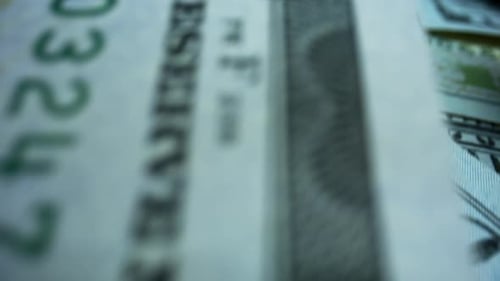 Macro shot of new american dollars cash money and benjamin franklin portrait