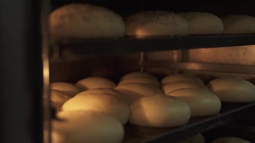 Close up inside an oven where bread is being baked seen in slow motion