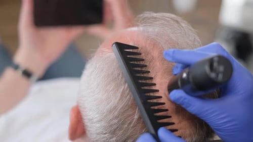 Medical Exam of Scalp and Hair with Comb