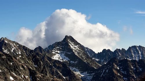 Alpine Rocky Mountain in the National Park Forming Clouds