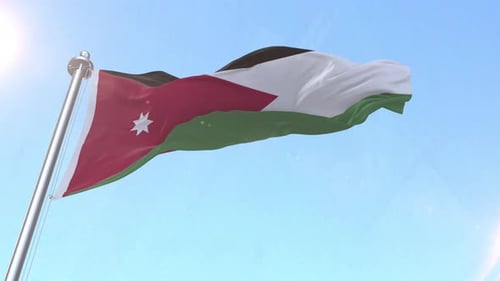Jordan National Flag Waving Against Bright Blue Sky