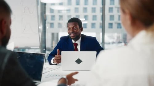 Business Conference in Modern Office Diverse People Discussing Business Deals Cheerful Black Man and