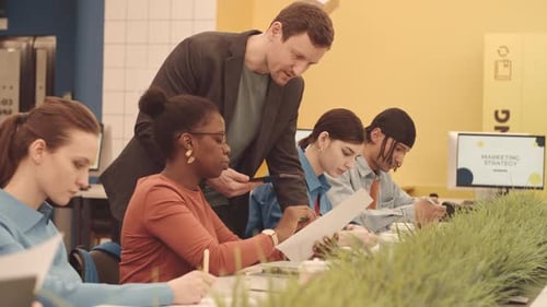 Diverse University Students at Marketing Class