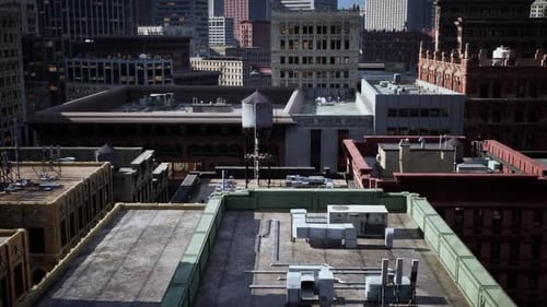 Daytime Urban Rooftop View of Buildings and City Skyline