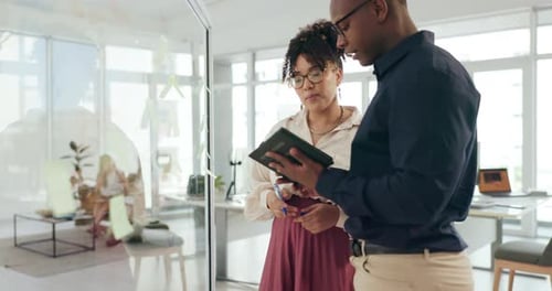 Business people, glass and teamwork with sticky notes for writing, brainstorming and collaboration