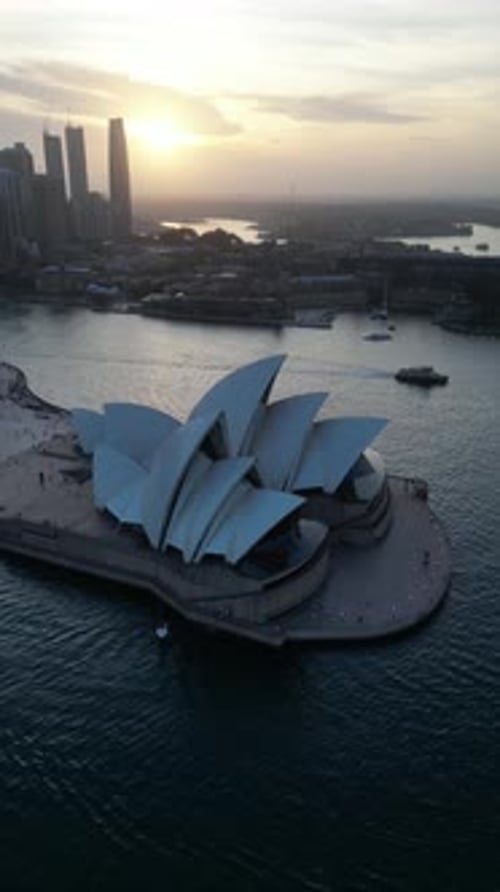 Aerial video of Sydney City and Sydney Harbour, Australia, at sunset