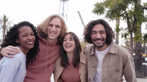 Friends Laughing Together in City Environment