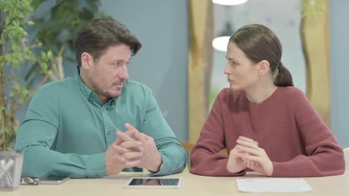 Close Up of Talking Creative People Discussing Project