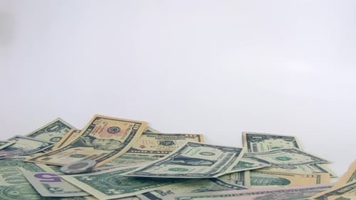 Money Cash, Us Dollars bills falling in slow motion, studio illustration of American currency, chang