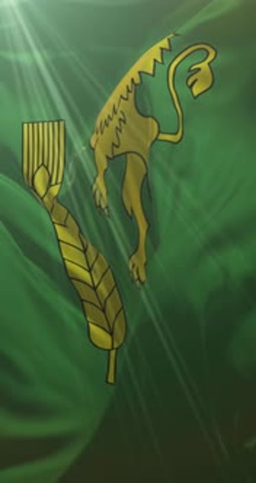 Waving Green Flag with Golden Lion and Wheat Emblem Vertical Background