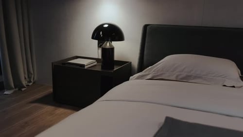 Modern bedroom interior with bed and bedside table