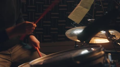 Close Up Shot of Male Musician Plays a Drum Kit