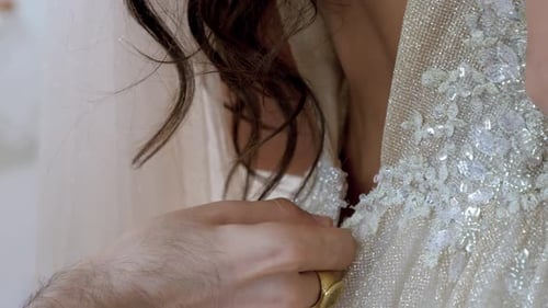 Bride Prepares for Wedding Ceremony in Ornate Gown
