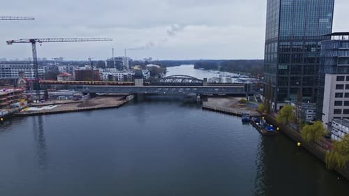 Aerial view of train crossing Parkweg bridge over spree river , Berlin