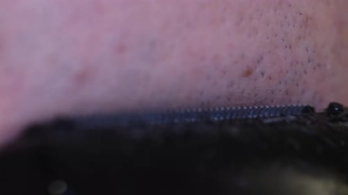 A Closeup View of Skin Texture During Grooming Highlighting Fine Hair Follicles and Surface Features