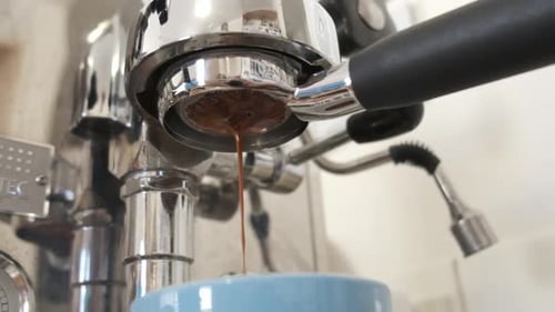Espresso Brewing From Stainless Steel Machine Close Up