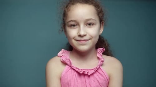 Smiling Girl Portrait Close Up in Studio