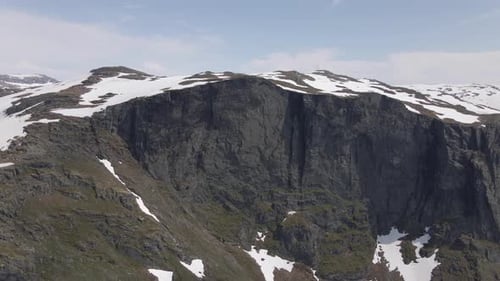 Drone video of the melting snow in the mountains. Located in the region of Hardanger, Norway.