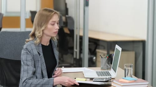 Businesswoman Working at Modern Office