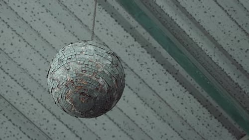 Old Style Vintage Disco Ball in a Scary Abandoned Place Apocalypse