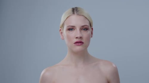Woman Posing Elegantly in Studio, Close Up
