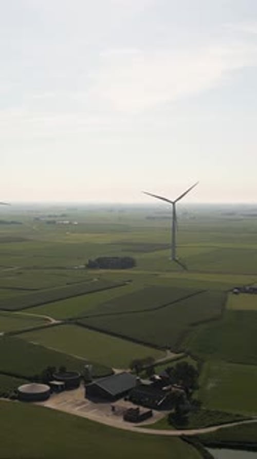 Aerial view of wind turbines in rural landscape