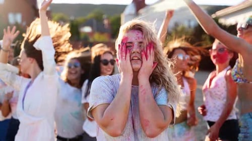 Young People Celebrate Holi with Color Powder