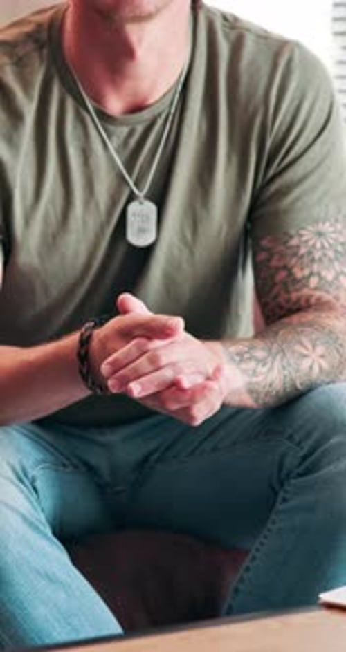 Man Sitting and Talking in Casual Setting