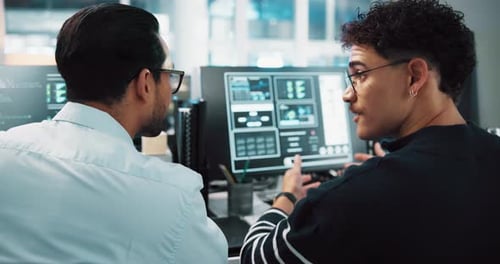 Men, developer and talking with computer in office for programming, coding success